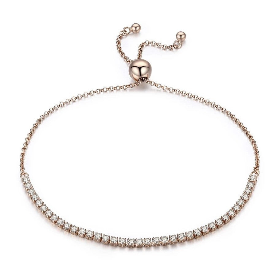 Rose gold bracelet with diamond accents on a white background