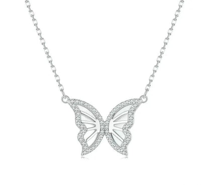 Silver butterfly necklace on a white background