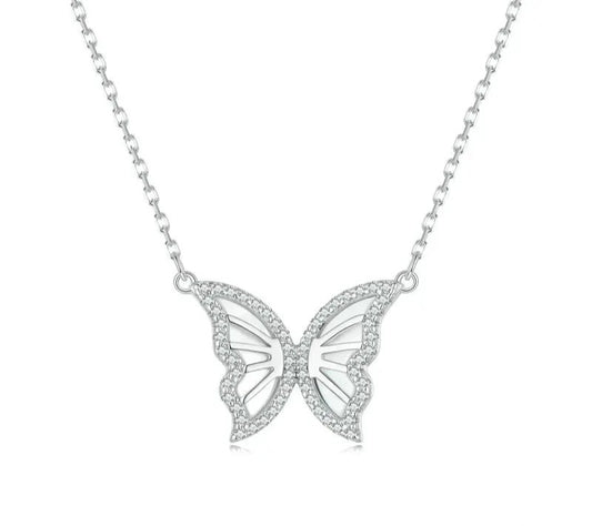 Silver butterfly necklace on a white background