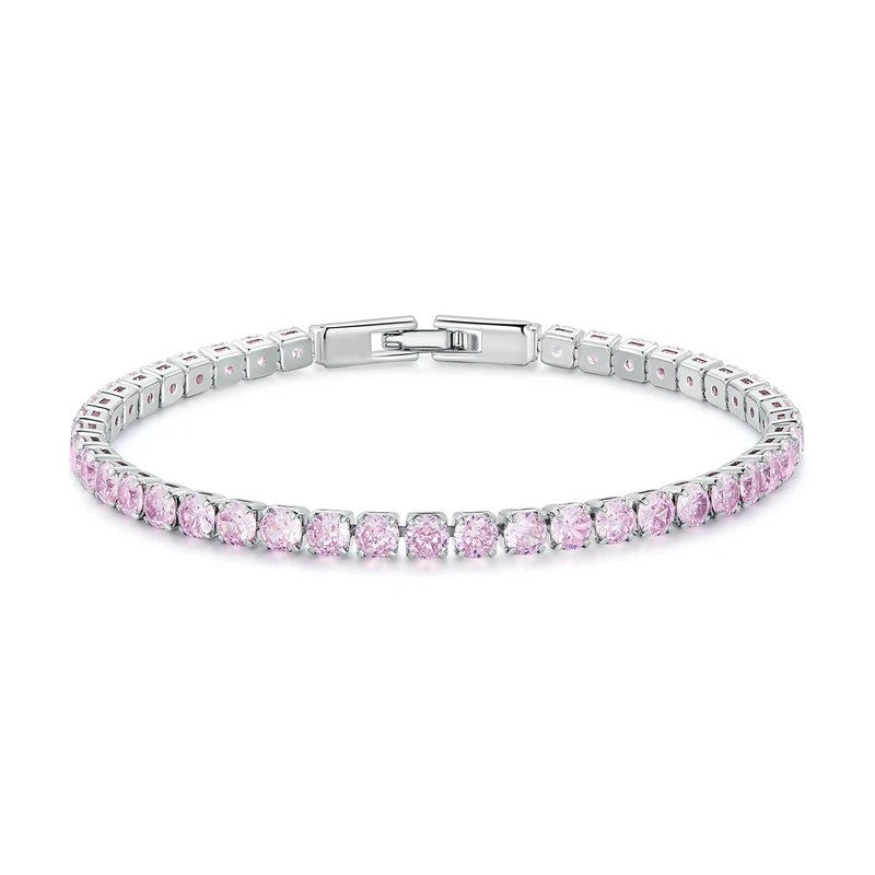 Silver bracelet with pink gemstones on a white background