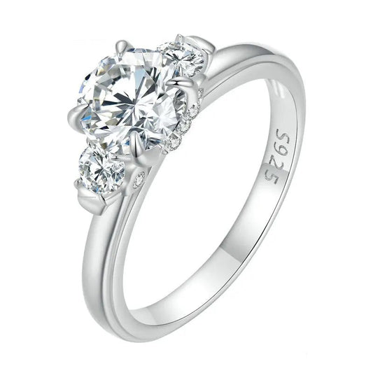 Silver ring with two diamonds on a white background