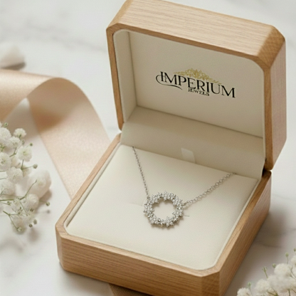 Jewelry box with a diamond necklace inside, branded 'Imperium Jewels'.