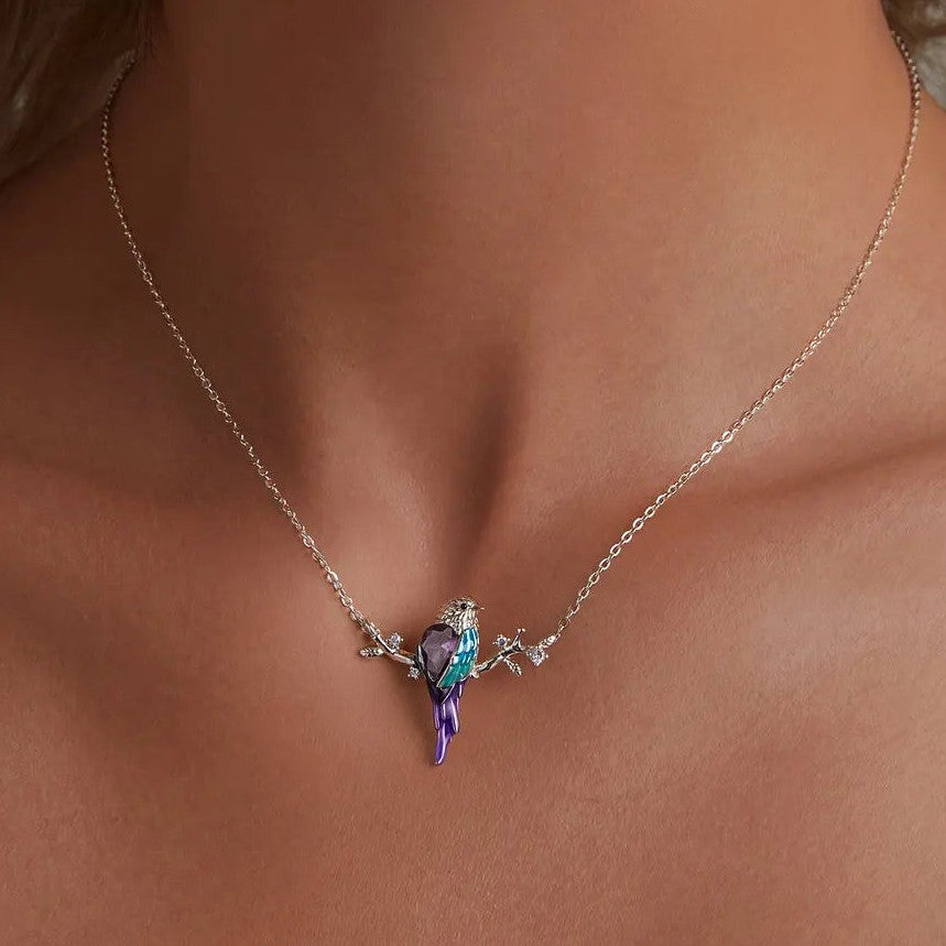 Necklace with a parrot pendant on a person's neck