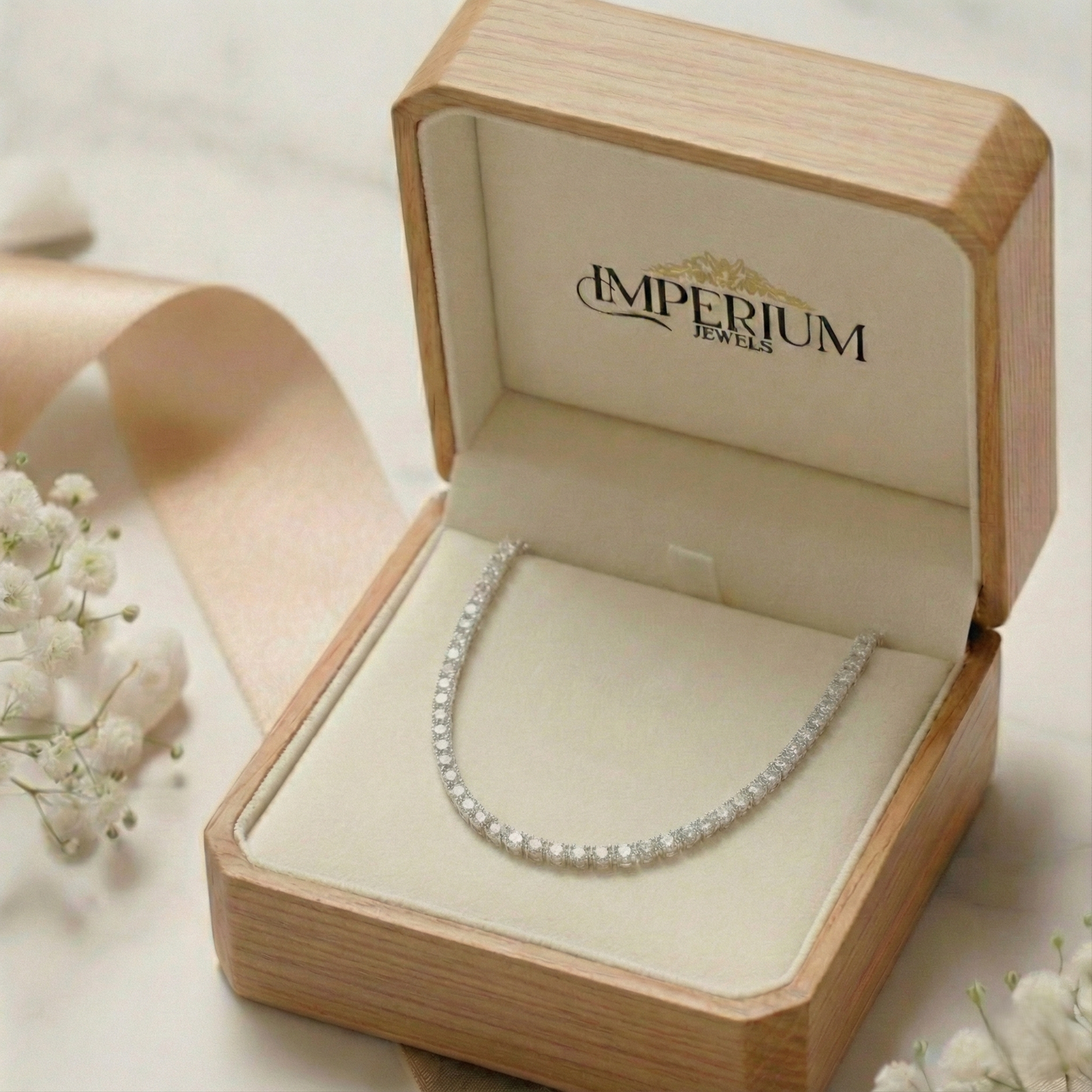 Diamond necklace in an open wooden jewelry box with 'Imperium Jewels' branding.