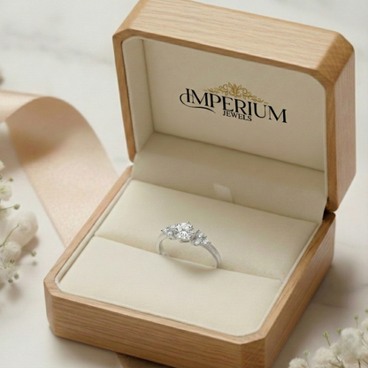 Diamond ring in a wooden box with 'Imperium Jewels' branding