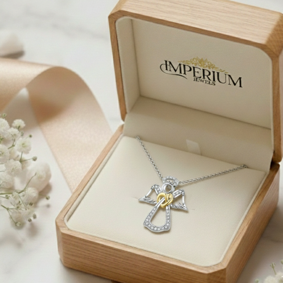 Jewelry box with an angel necklace and 'Imperium Jewels' branding.