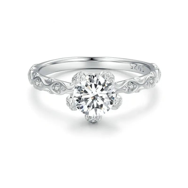 Diamond ring with intricate design on a white background