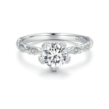 Diamond ring with intricate design on a white background