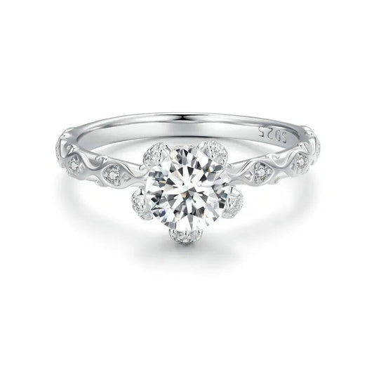 Diamond ring with intricate design on a white background